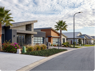 New homes on a palm-lined street